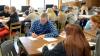 A classroom of kids working on desks